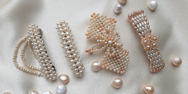 Spinki z perłami – jak je nosić, żeby wyglądać stylowo? Poradnik