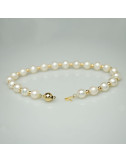 Gold bracelet with white pearls B6065KUS3