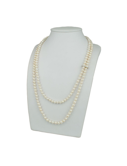 String of white oval pearls, with a delicate pin decorated with zircons that connects 2 rows of pearls P899.
