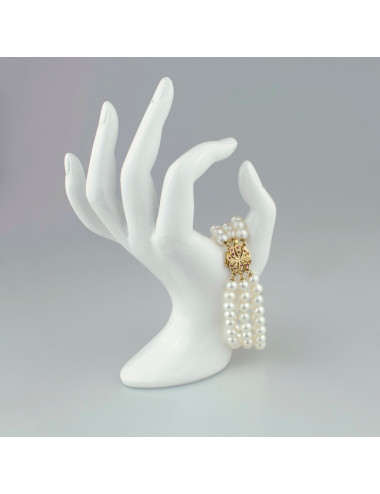 3-row white round pearl bracelet with large gold clasp embellished with rubies B0657GX3