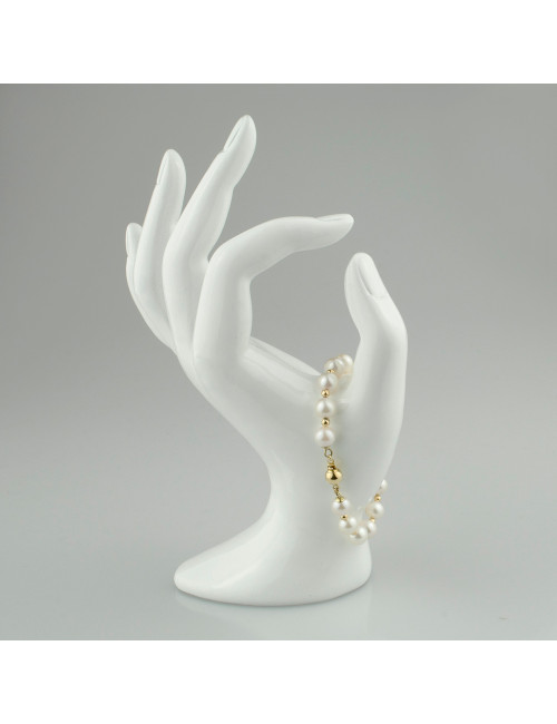 Bracelet of white Akoya pearls intertwined with beads made of 14K gold BmO775KUG2