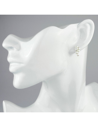 Silver post earrings with six interconnected white pearls KS34S