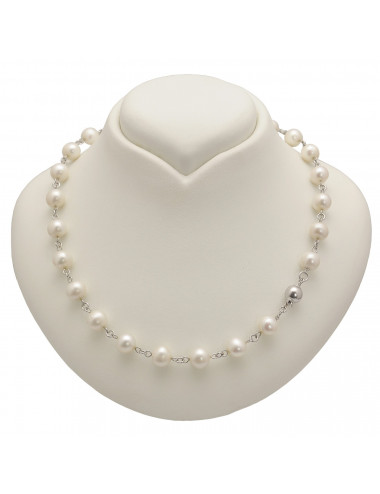 Silver necklace with white pearls spaced between pieces of chain NLAN995S3