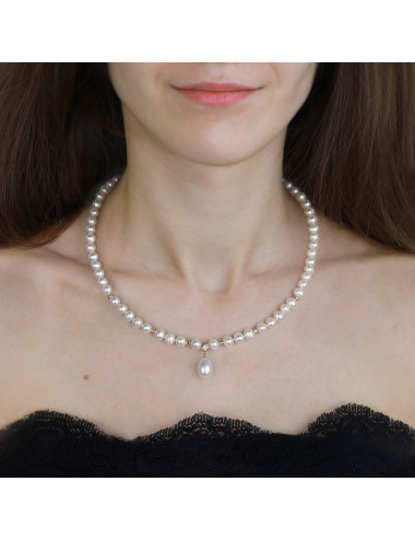 White pearl necklace with gold beads and large teardrop pendant presented on model N6070ZG